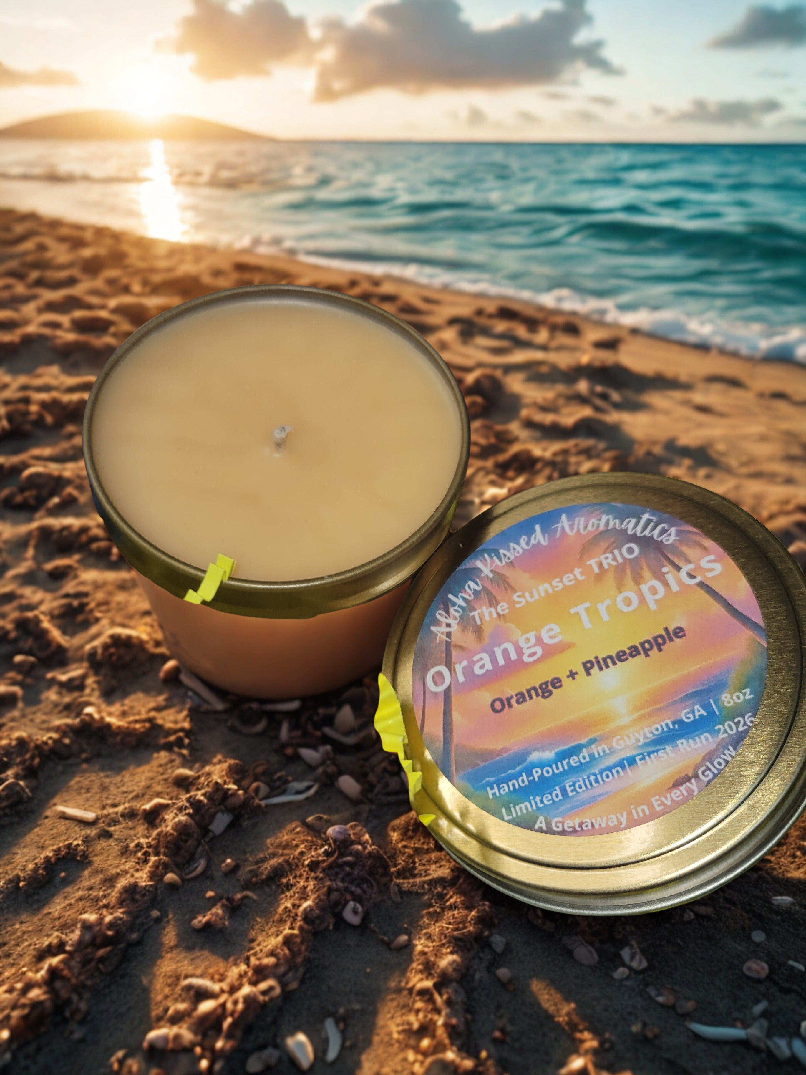 Orange Tropics candle in 8oz gold tin featuring vibrant citrus and sun-ripened island orange