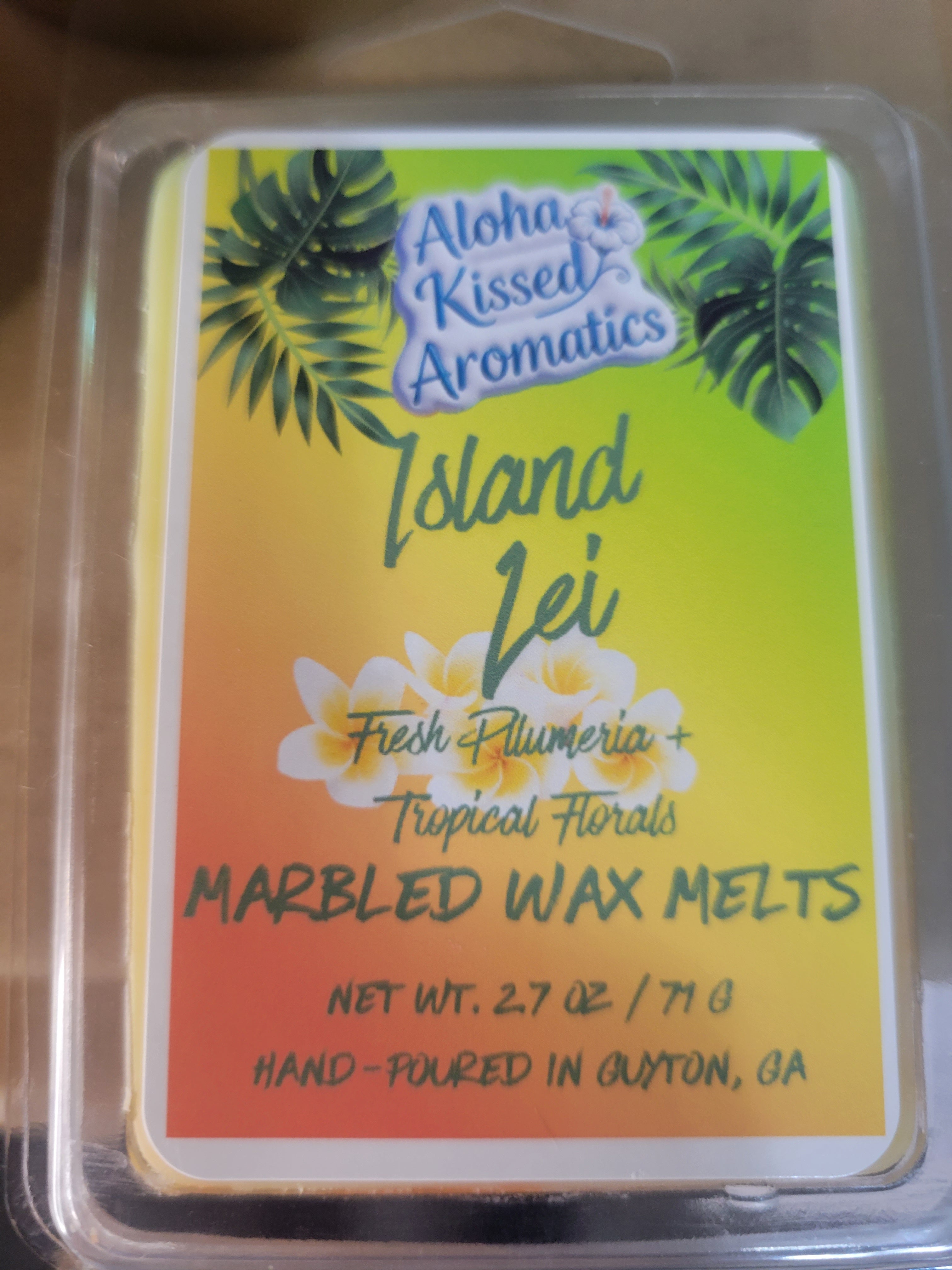 Vibrant hand-marbled floral wax melts with pink and white swirls, inspired by Hawaiian Lei flowers, by Aloha Kissed Aromatics."