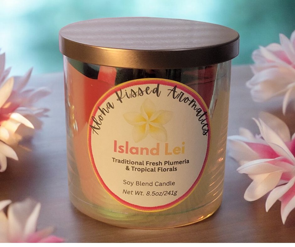 Island Lei floral candle in iridescent Prism glass featuring tropical hibiscus and plumeria.
