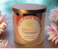 Island Lei floral candle in iridescent Prism glass featuring tropical hibiscus and plumeria.