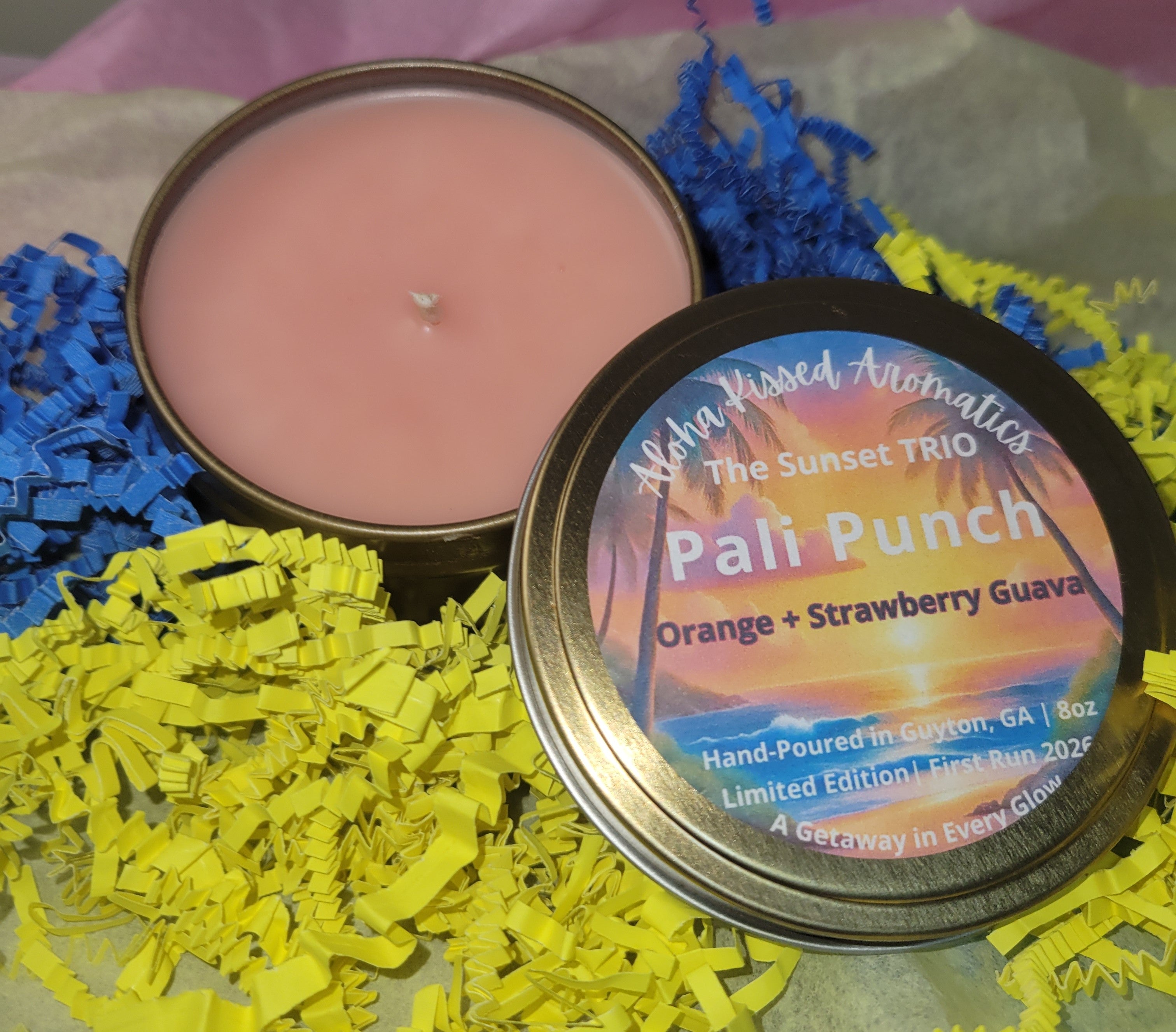 Pali Punch tropical fruit candle in 8oz gold tin with notes of citrus, guava, and island berries.
